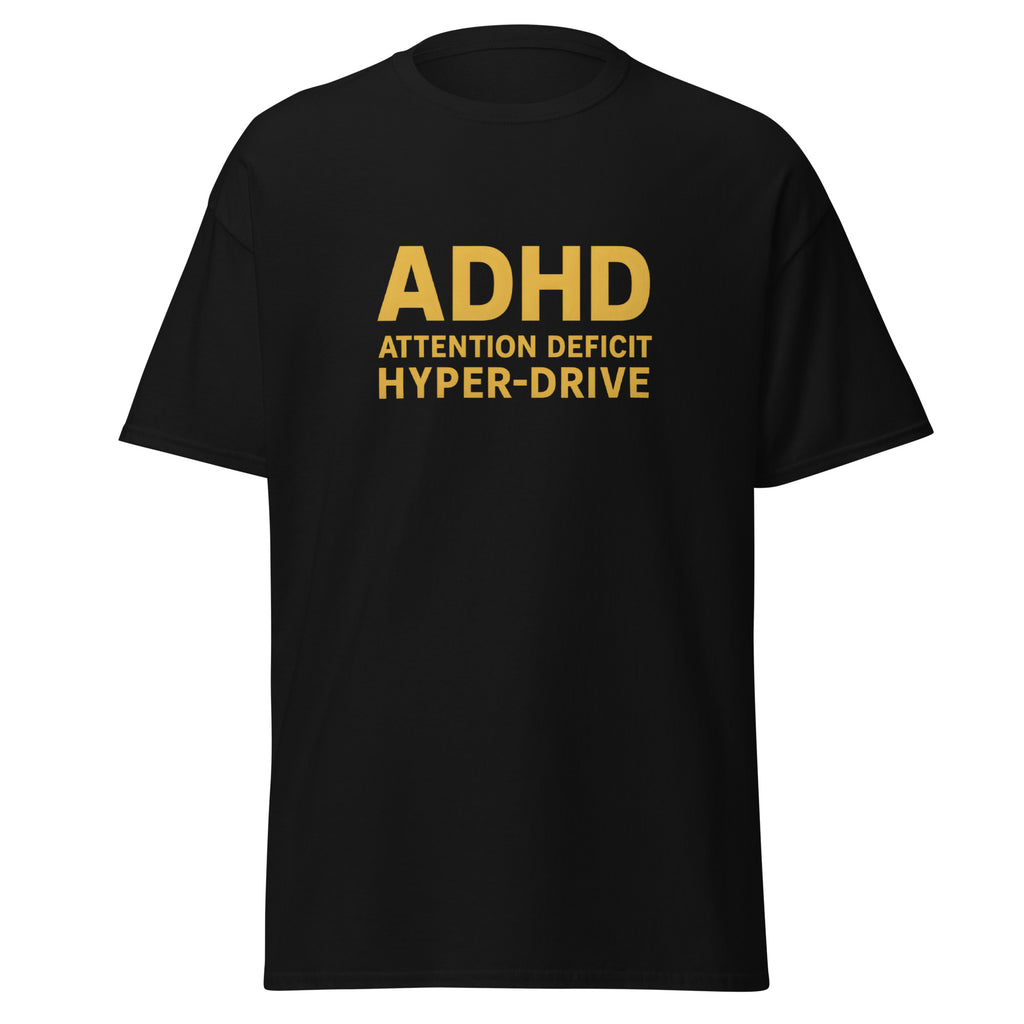 Black t-shirt with bold yellow text that reads, “ADHD Attention Deficit Hyper-Drive.”