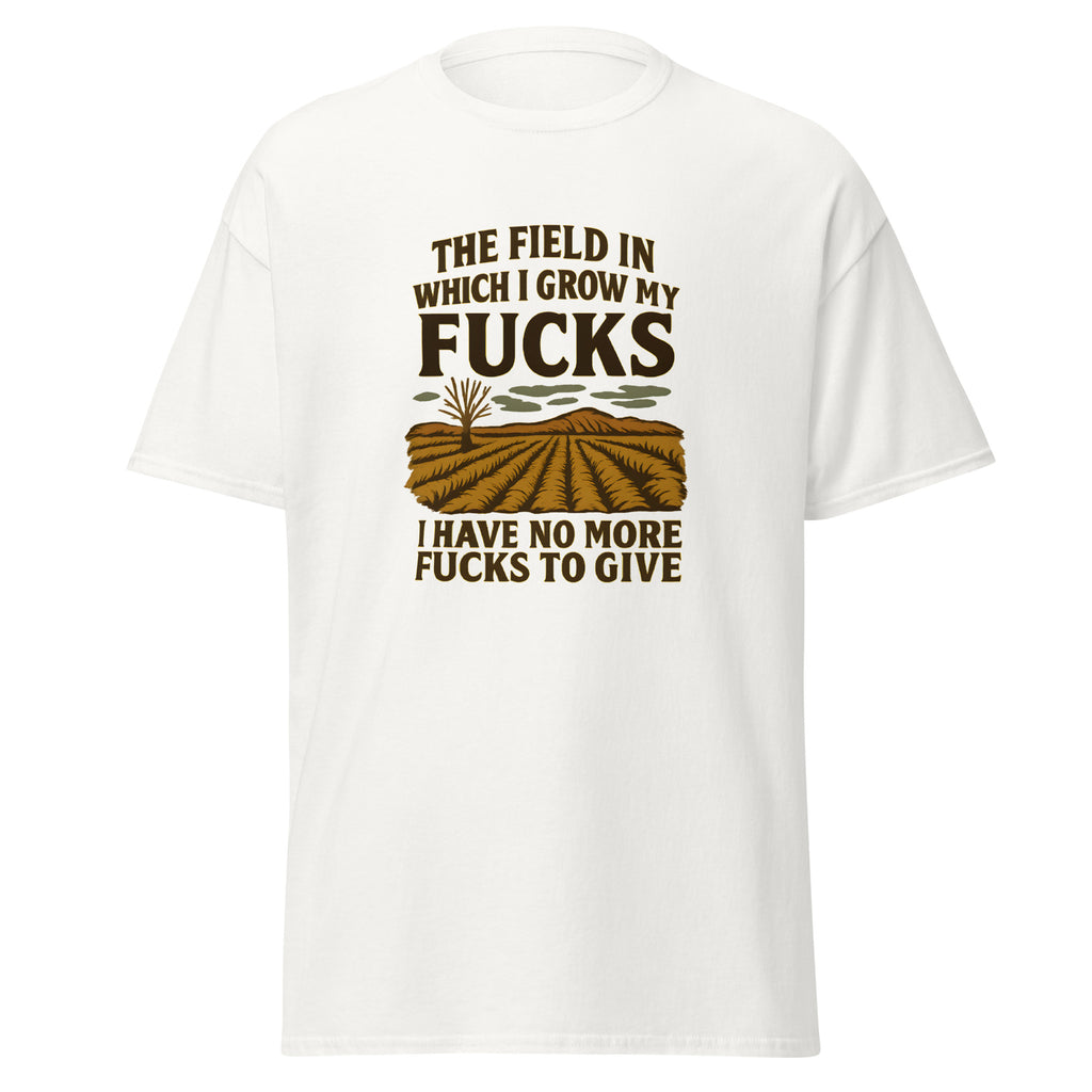 White t-shirt with a humorous design that reads, “The field in which I grow my fucks. I have no more fucks to give,” above and below an illustration of a barren field.