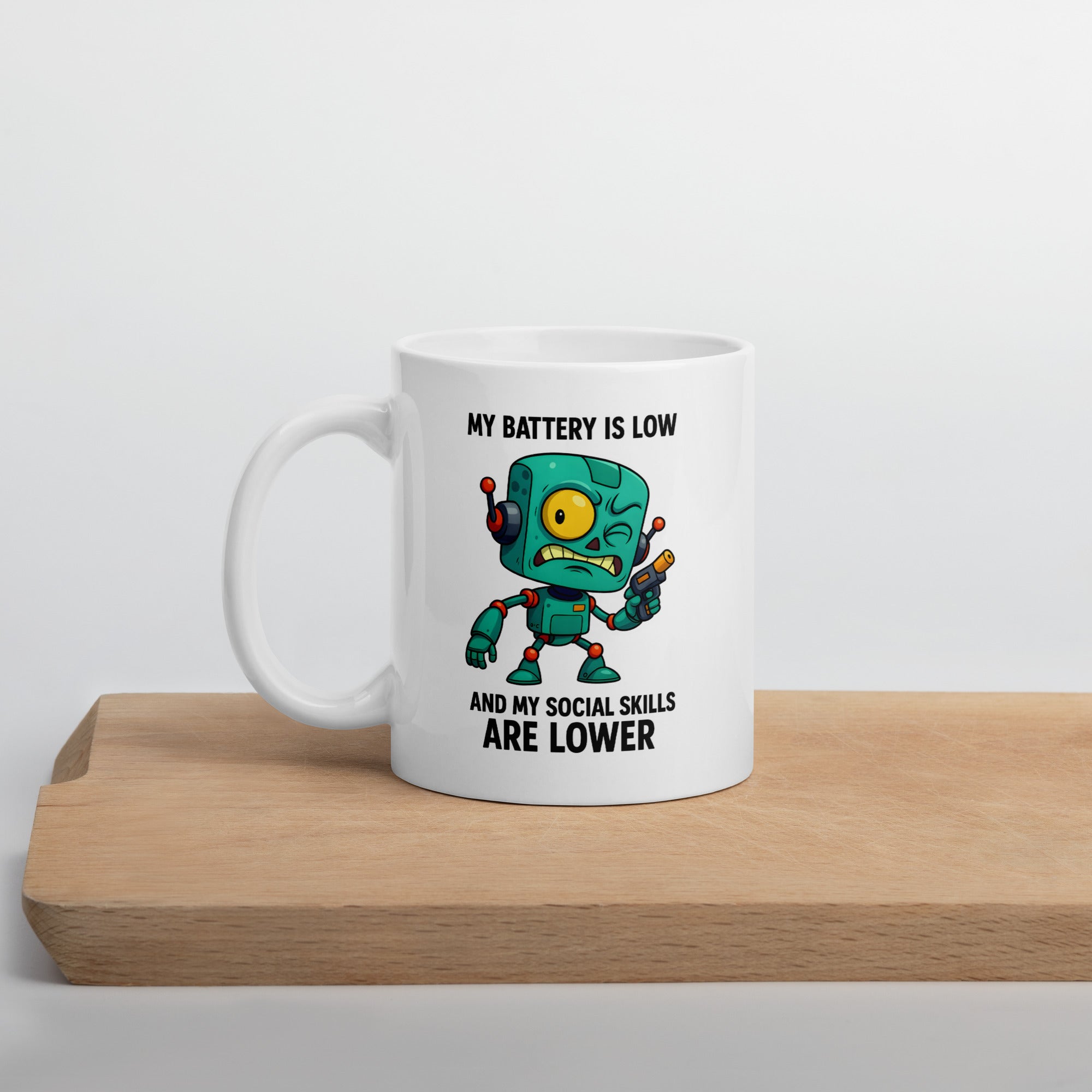 White mug with funny low-battery robot design.