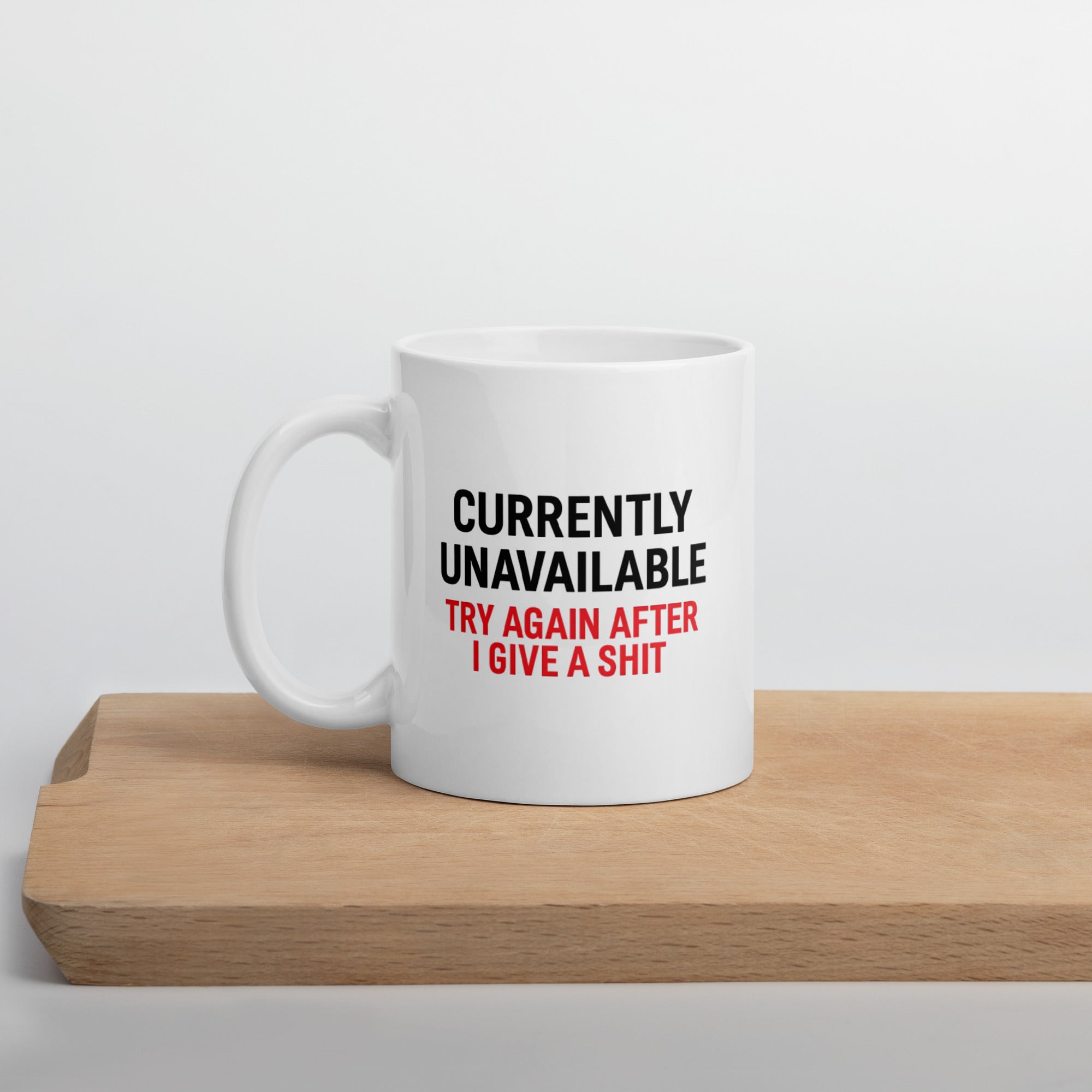 Funny sarcastic coffee mug with quote “Currently Unavailable, Try Again After I Give a Sh*t” in bold black and red text.